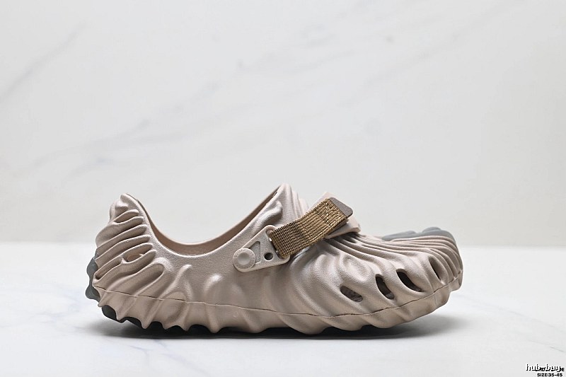 Fashionable beige Crocs clogs